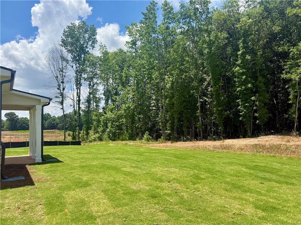 5 bedroom, 4 bathroom, 2,956 sq ft single family residence under contract at 104 Chickadee Court, Auburn, GA 30011 — photo 4