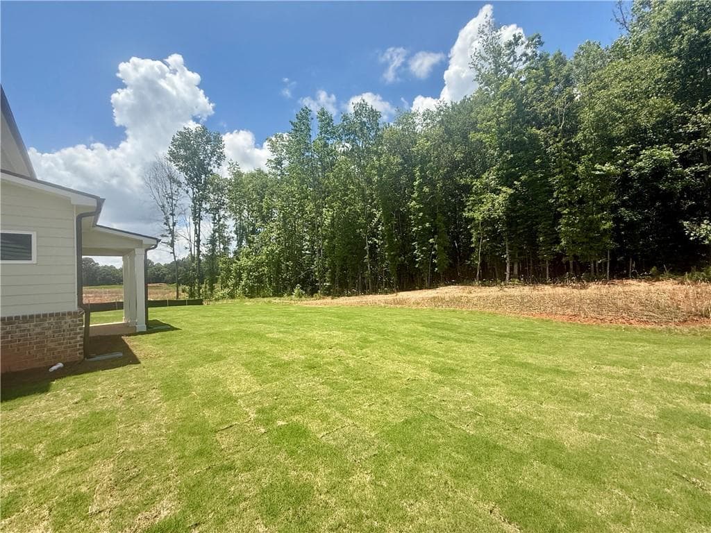 5 bedroom, 4 bathroom, 2,956 sq ft single family residence under contract at 104 Chickadee Court, Auburn, GA 30011 — photo 6