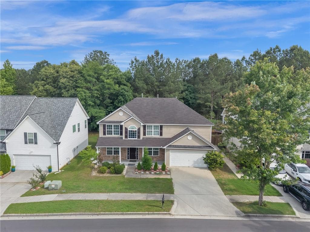 4 bedroom, 3 bathroom, 2,684 sq ft single family residence for sale at 4563 Grove Lake Street, Loganville, GA 30052 — photo 3