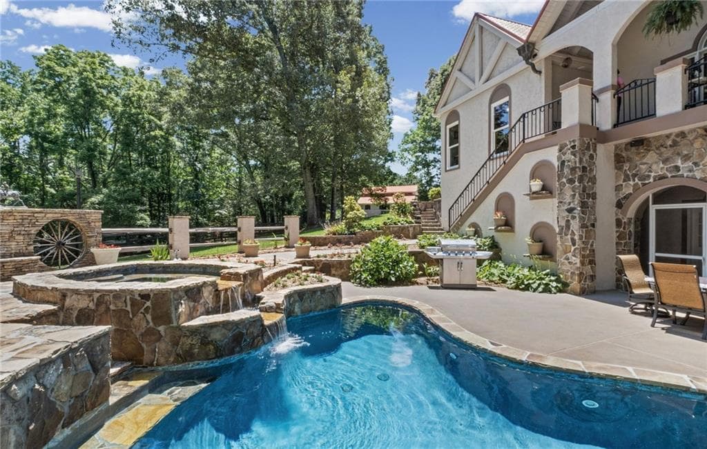 5 bedroom, 4 bathroom, 5,986 sq ft single family residence for sale at 253 Charles Road, Canton, GA 30115 — photo 2