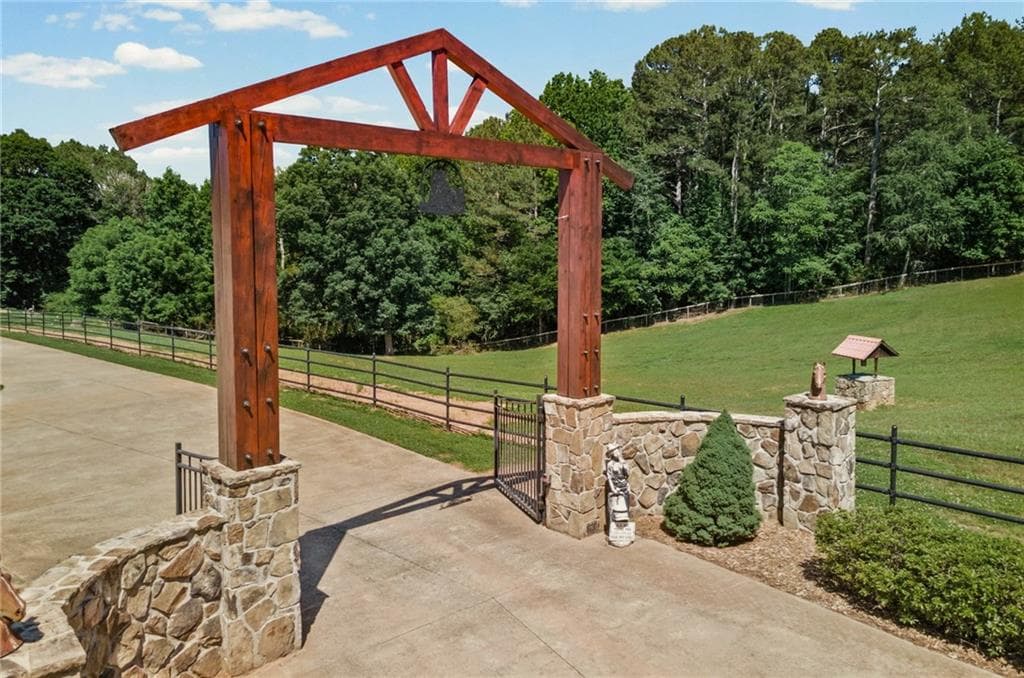 5 bedroom, 4 bathroom, 5,986 sq ft single family residence for sale at 253 Charles Road, Canton, GA 30115 — photo 5