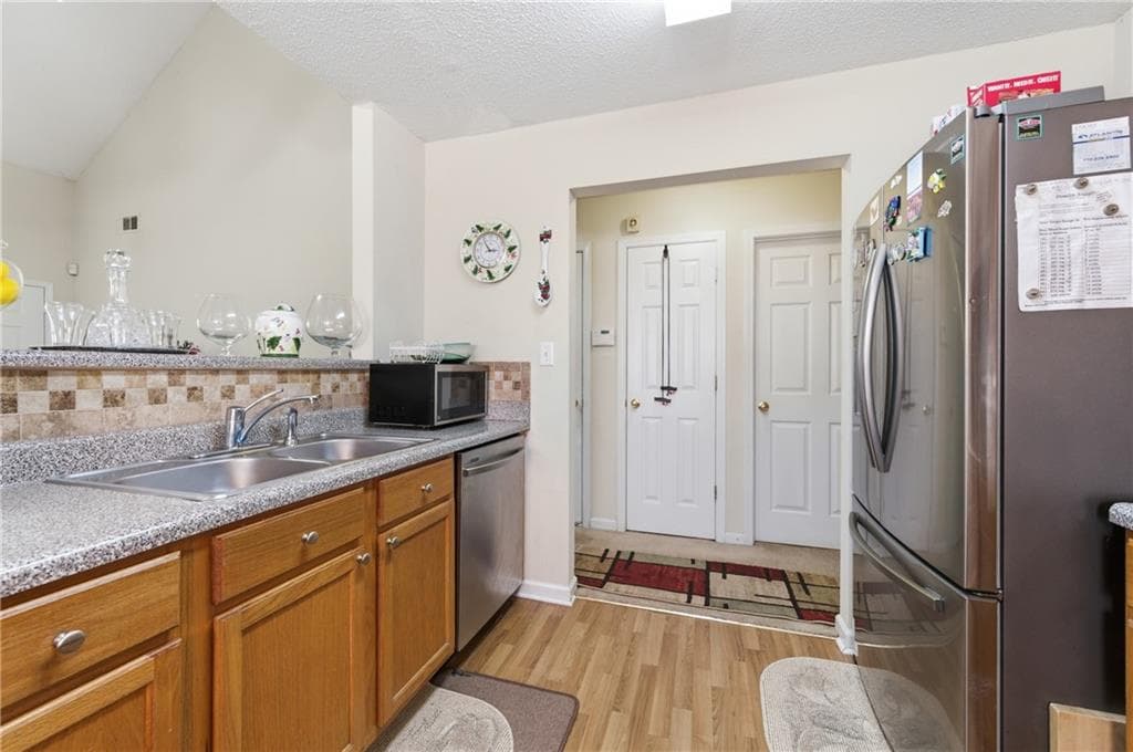 3 bedroom, 2 bathroom, 1,482 sq ft single family residence for sale at 7126 Ravenwood Lane, Lithonia, GA 30038 — photo 10
