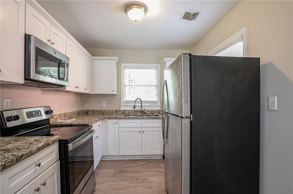 3 bedroom, 1 bathroom, 1,215 sq ft single family residence for sale at 1867 Pinedale Place, Decatur, GA 30032 — photo 8