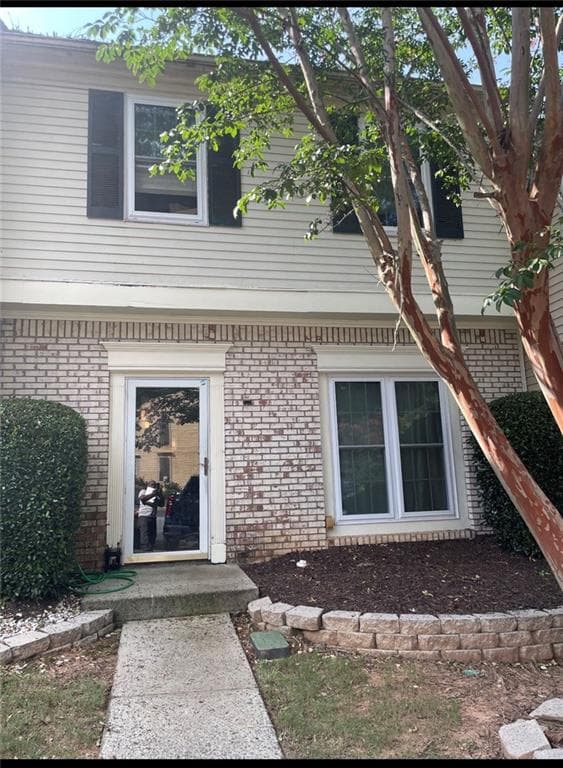 2 bedroom, 3 bathroom, 1,470 sq ft townhouse for sale at 3448 Washington Way, Atlanta, GA 30340 — photo 1 of 8