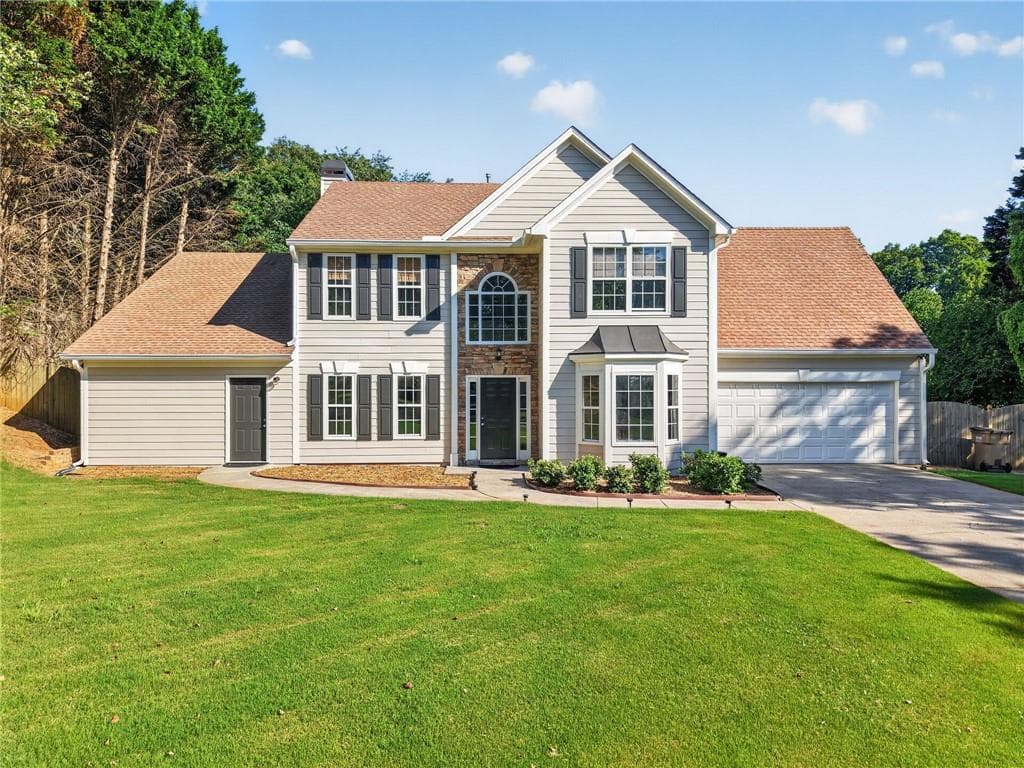 5 bedroom, 4 bathroom, 2,750 sq ft single family residence for sale at 1835 Westwind Drive, Cumming, GA 30041 — photo 4