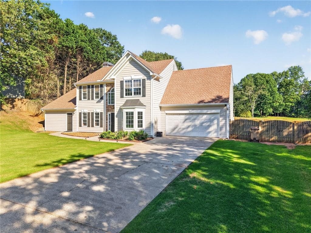 5 bedroom, 4 bathroom, 2,750 sq ft single family residence for sale at 1835 Westwind Drive, Cumming, GA 30041 — photo 5