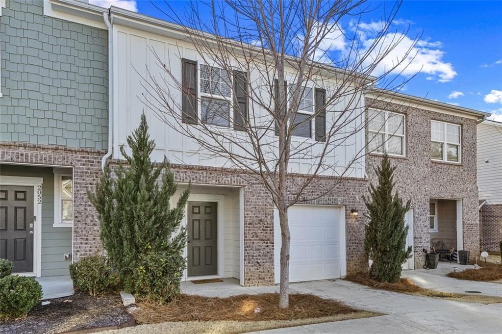 2 bedroom, 3 bathroom, 1,589 sq ft townhouse for sale at 2056 Wildflower Way, Conyers, GA 30012 — photo 2