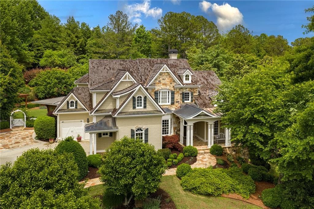 6 bedroom, 8 bathroom, 6,890 sq ft single family residence sold at 785 Owens Lake Road, Milton, GA 30004