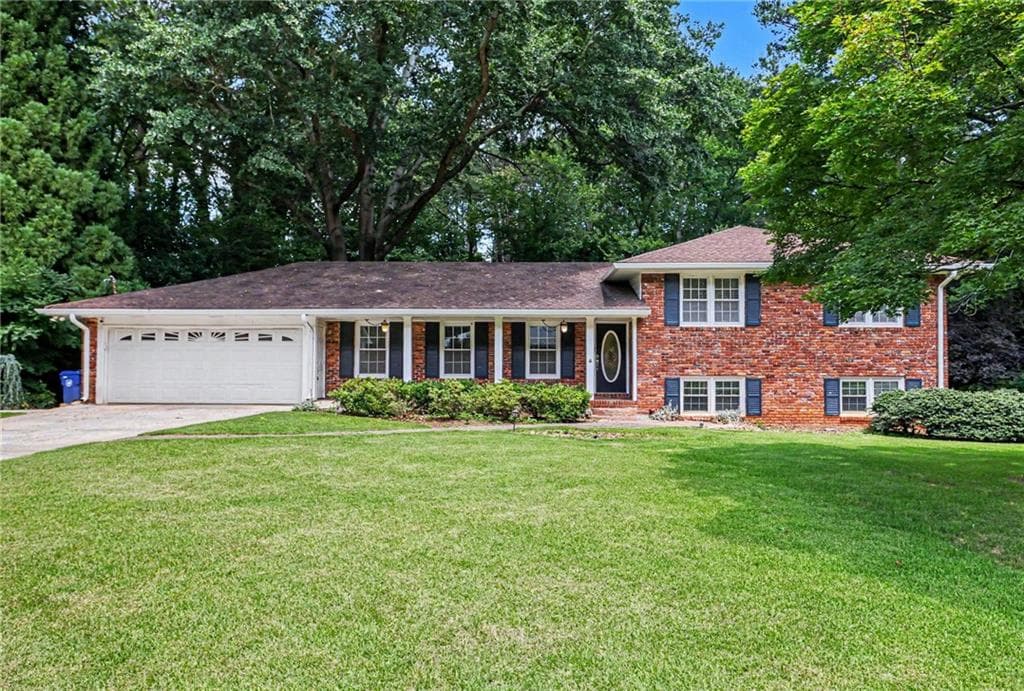 4 bedroom, 3 bathroom, 2,451 sq ft single family residence for sale at 3135 Wanda Woods Drive, Atlanta, GA 30340 — photo 1 of 41