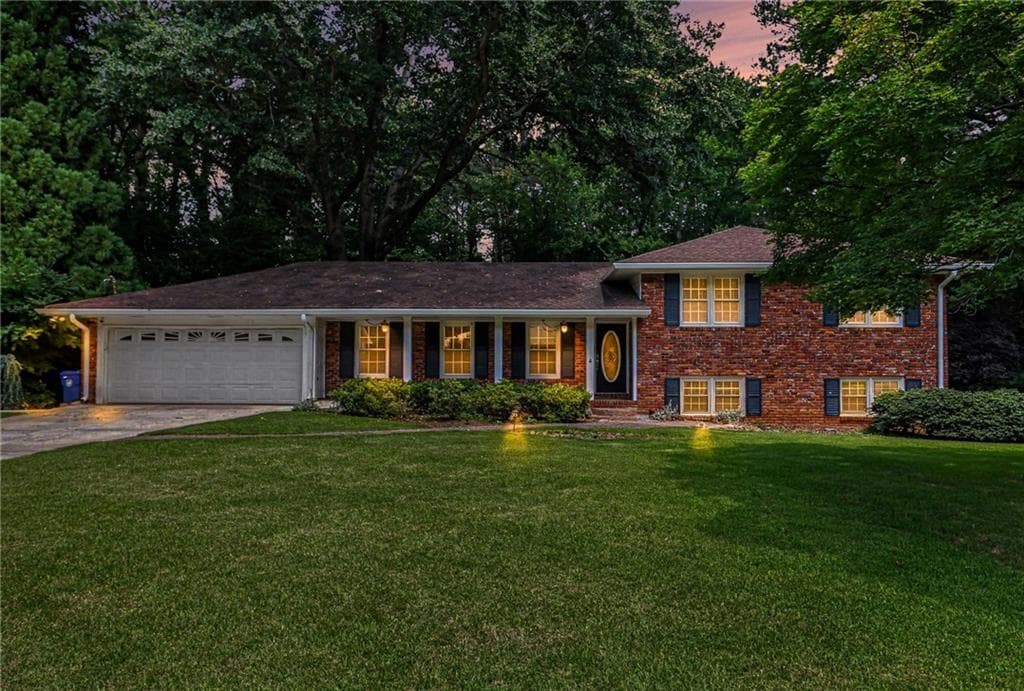 4 bedroom, 3 bathroom, 2,451 sq ft single family residence for sale at 3135 Wanda Woods Drive, Atlanta, GA 30340 — photo 2