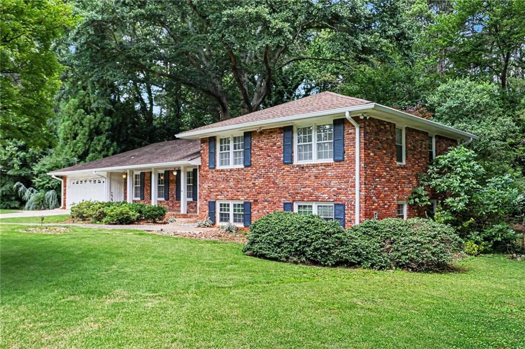 4 bedroom, 3 bathroom, 2,451 sq ft single family residence for sale at 3135 Wanda Woods Drive, Atlanta, GA 30340 — photo 3