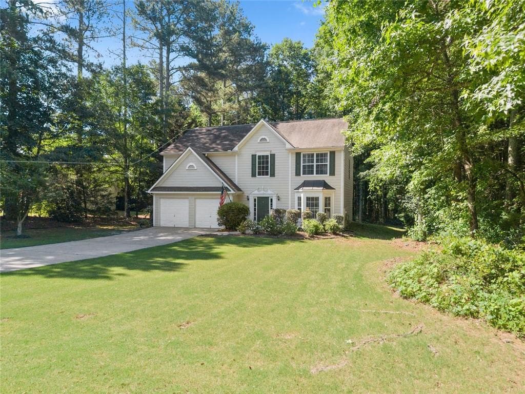 3 bedroom, 3 bathroom, 2,000 sq ft single family residence for sale at 5760 Woodstone Drive, Cumming, GA 30028 — photo 4
