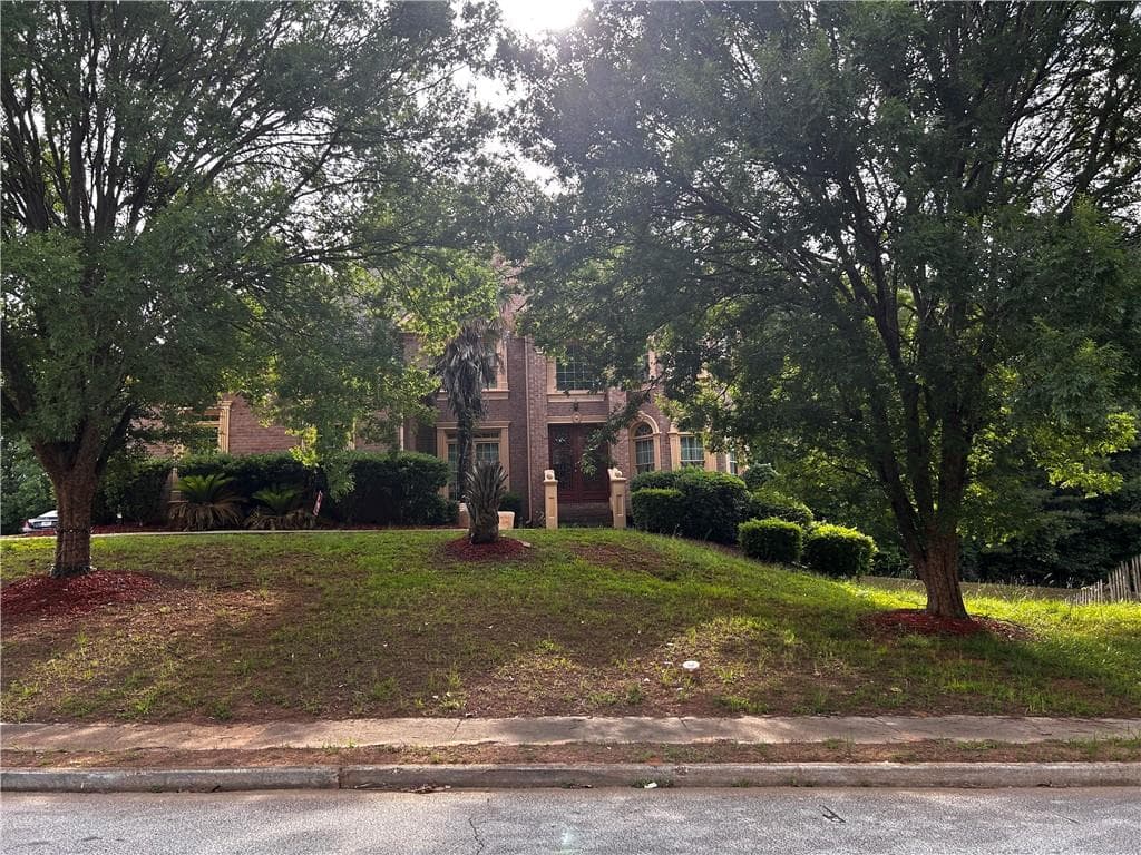 4 bedroom, 4 bathroom, 6,287 sq ft single family residence for sale at 4547 Mossey Drive, Lithonia, GA 30038 — photo 2