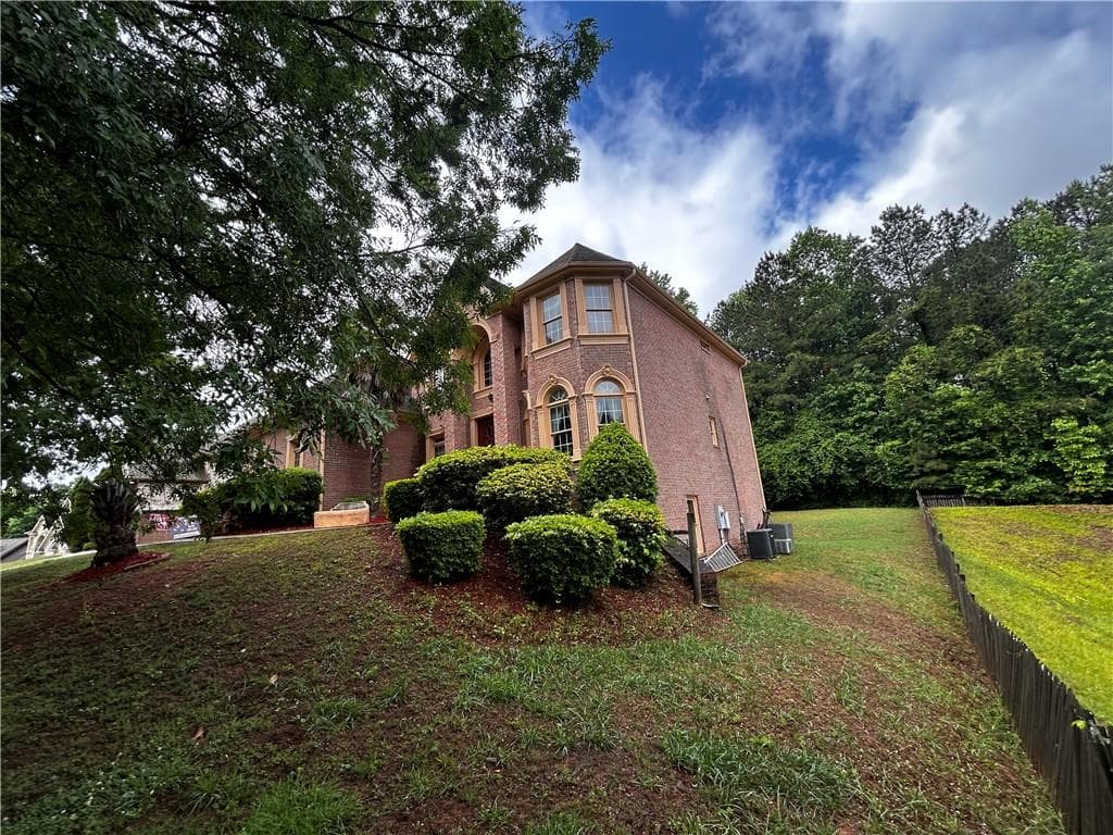 4 bedroom, 4 bathroom, 6,287 sq ft single family residence for sale at 4547 Mossey Drive, Lithonia, GA 30038 — photo 3
