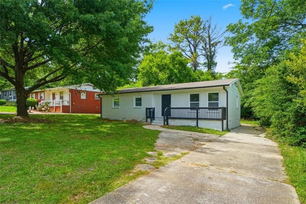 4 bedroom, 2 bathroom, 1,254 sq ft single family residence for sale at 1929 Bandera Drive, Decatur, GA 30032 — photo 2