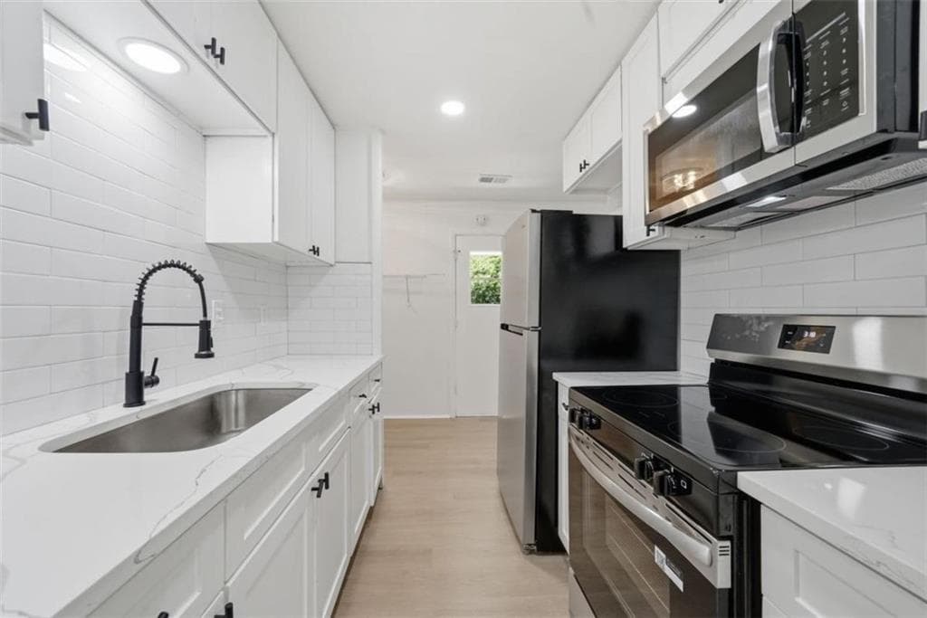 4 bedroom, 2 bathroom, 1,254 sq ft single family residence for sale at 1929 Bandera Drive, Decatur, GA 30032 — photo 8