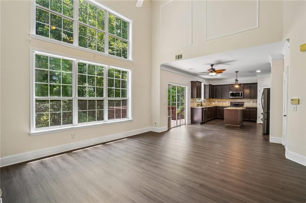 4 bedroom, 3 bathroom, 4,027 sq ft single family residence for sale at 6815 Grand Magnolia Drive, Sugar Hill, GA 30518 — photo 6