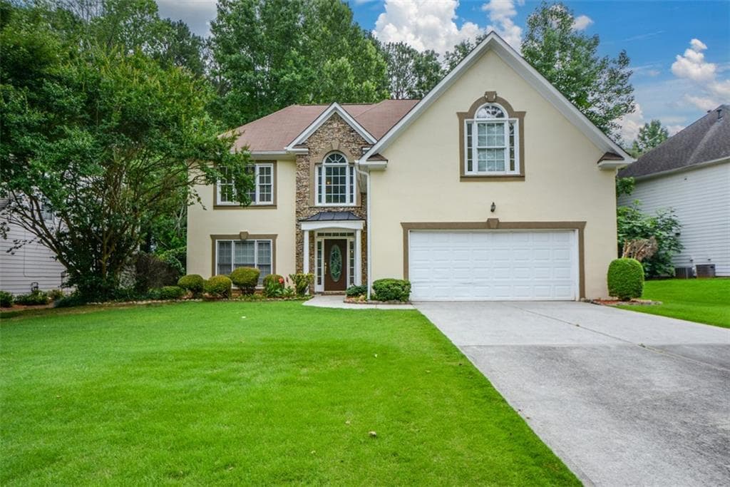 4 bedroom, 3 bathroom, 2,834 sq ft single family residence for sale at 4736 Cedar Wood Drive, Lilburn, GA 30047