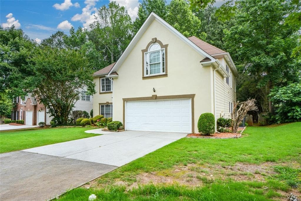 4 bedroom, 3 bathroom, 2,834 sq ft single family residence for sale at 4736 Cedar Wood Drive, Lilburn, GA 30047 — photo 2