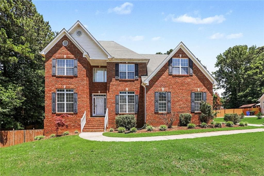 5 bedroom, 4 bathroom, 3,001 sq ft single family residence for sale at 165 Normandy Drive, Fayetteville, GA 30214 — photo 1 of 35