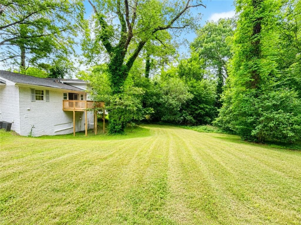 5 bedroom, 3 bathroom, 1,822 sq ft single family residence for sale at 2783 Mcafee Road, Decatur, GA 30032 — photo 4
