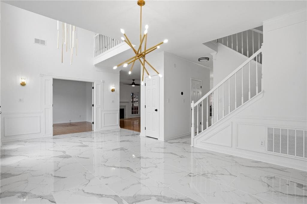 4 bedroom, 4 bathroom, 2,992 sq ft single family residence for sale at 265 Marchand Court, Atlanta, GA 30328 — photo 4