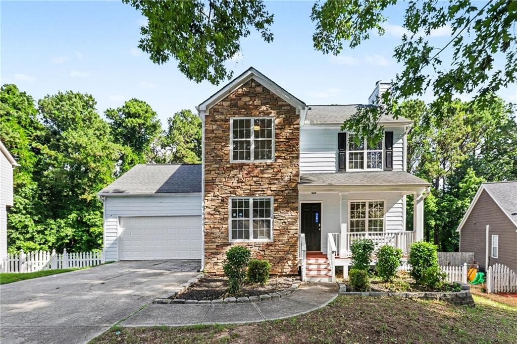 4 bedroom, 4 bathroom, 2,499 sq ft single family residence for sale at 975 Riverside Walk Crossing, Sugar Hill, GA 30518 — photo 1 of 17