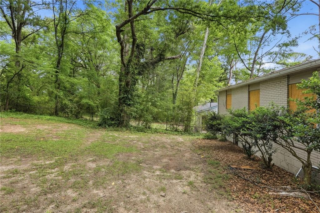 3 bedroom, 1 bathroom, 1,050 sq ft single family residence for sale at 312 Fairburn Road, Atlanta, GA 30331 — photo 2