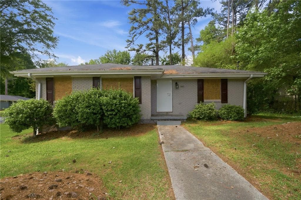 3 bedroom, 2 bathroom, 1,120 sq ft single family residence for sale at 1805 Rosewood Road, Decatur, GA 30032 — photo 1 of 28