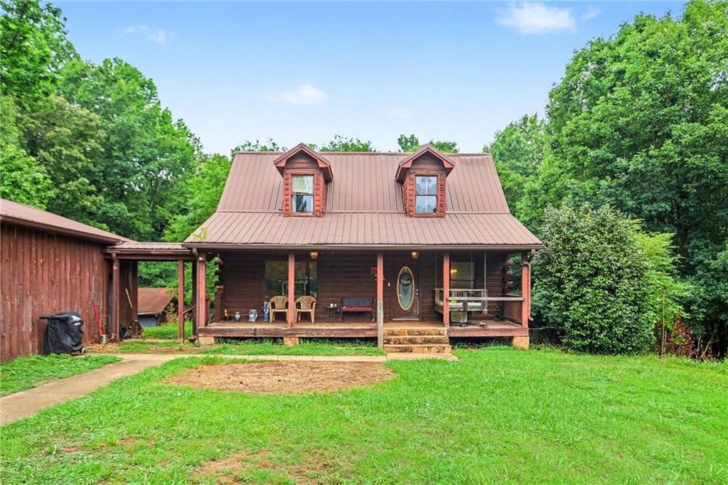 4 bedroom, 3 bathroom, 2,176 sq ft single family residence for sale at 385 Bar J Road, Temple, GA 30179 — photo 1 of 31