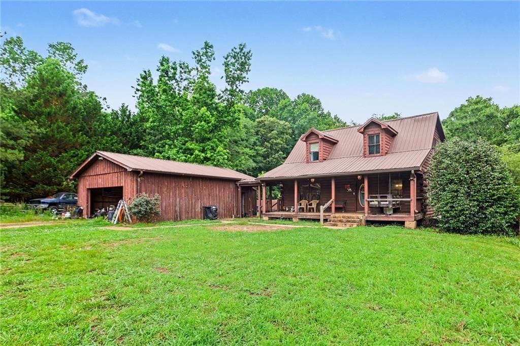 4 bedroom, 3 bathroom, 2,176 sq ft single family residence for sale at 385 Bar J Road, Temple, GA 30179 — photo 2