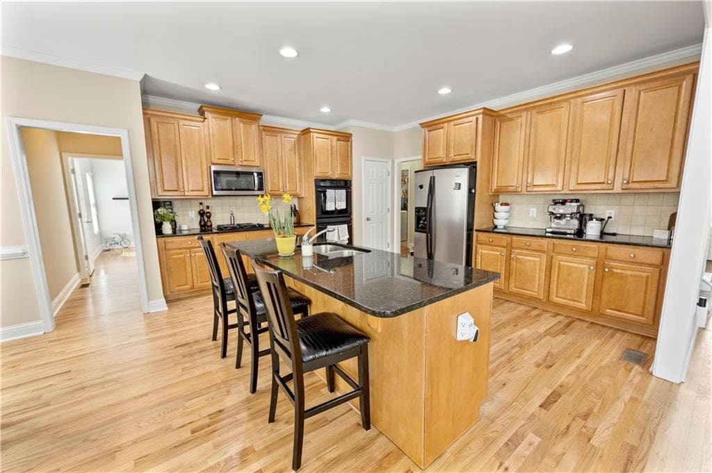 5 bedroom, 4 bathroom, 4,831 sq ft single family residence for sale at 5213 Millwood Drive, Canton, GA 30114 — photo 9