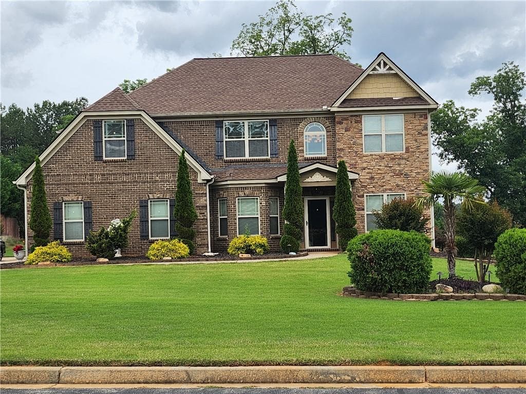 5 bedroom, 4 bathroom, 3,965 sq ft single family residence sold at 118 Shimmering Waters Lane, Fayetteville, GA 30214