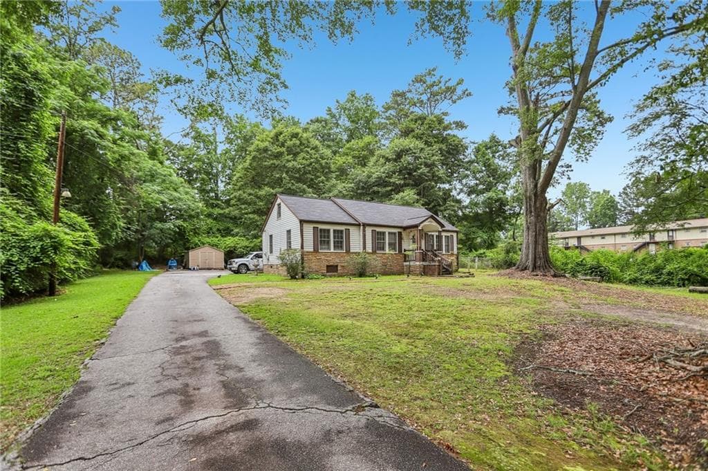 3 bedroom, 1 bathroom, 1,562 sq ft single family residence for sale at 5830 Garner Road, Mableton, GA 30126 — photo 2