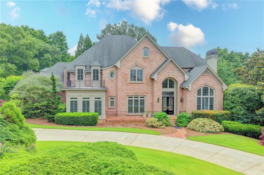6 bedroom, 7 bathroom, 8,061 sq ft single family residence sold at 2320 Sugarloaf Club Drive, Duluth, GA 30097