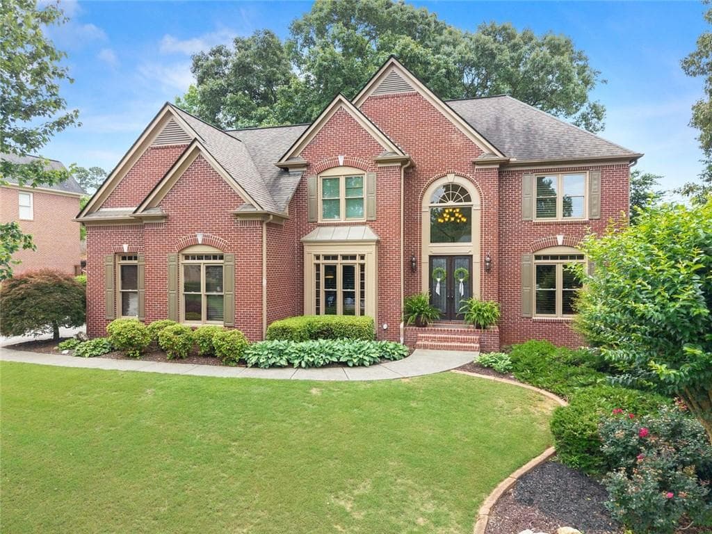 4 bedroom, 4 bathroom, 4,546 sq ft single family residence sold at 5225 McIntosh Drive, Cumming, GA 30040