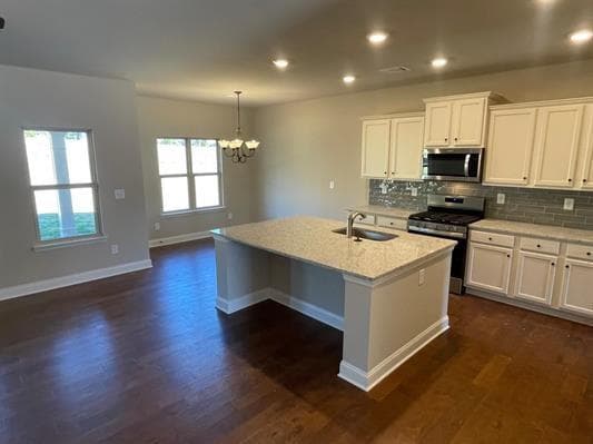 4 bedroom, 3 bathroom single family residence for sale at 1006 Lakeview Oaks Court, Grayson, GA 30017 — photo 6