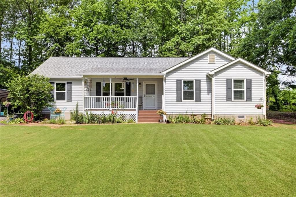 4 bedroom, 2 bathroom, 1,720 sq ft single family residence for sale at 3771 Castleberry Road, Cumming, GA 30040 — photo 2