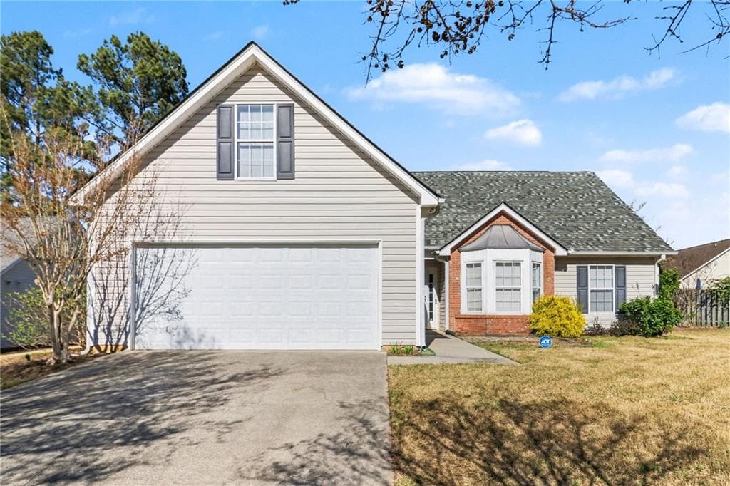 4 bedroom, 2 bathroom, 1,721 sq ft single family residence for sale at 2010 Nichols Landing Way, Dacula, GA 30019 — photo 2
