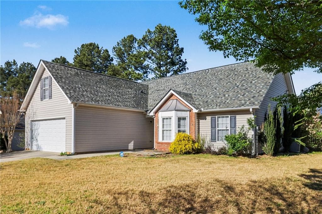 4 bedroom, 2 bathroom, 1,721 sq ft single family residence for sale at 2010 Nichols Landing Way, Dacula, GA 30019 — photo 3