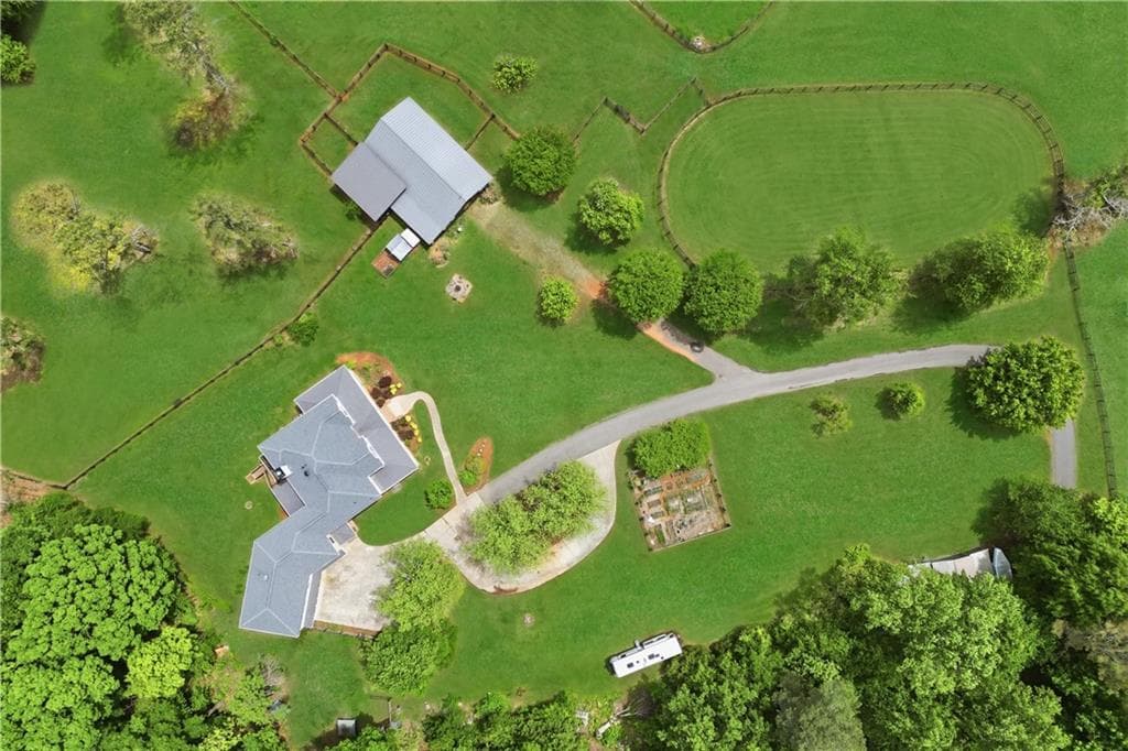 6 bedroom, 5 bathroom, 6,083 sq ft single family residence for sale at 3535 Dr Bramblett Road, Cumming, GA 30028 — photo 2