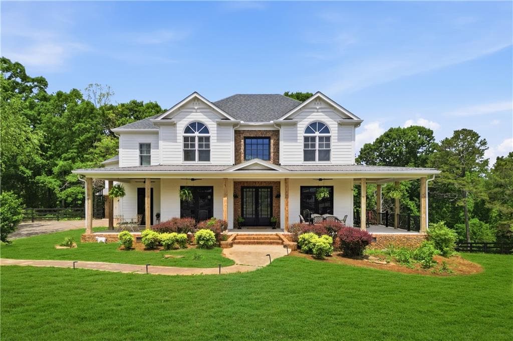 6 bedroom, 5 bathroom, 6,083 sq ft single family residence for sale at 3535 Dr Bramblett Road, Cumming, GA 30028 — photo 3