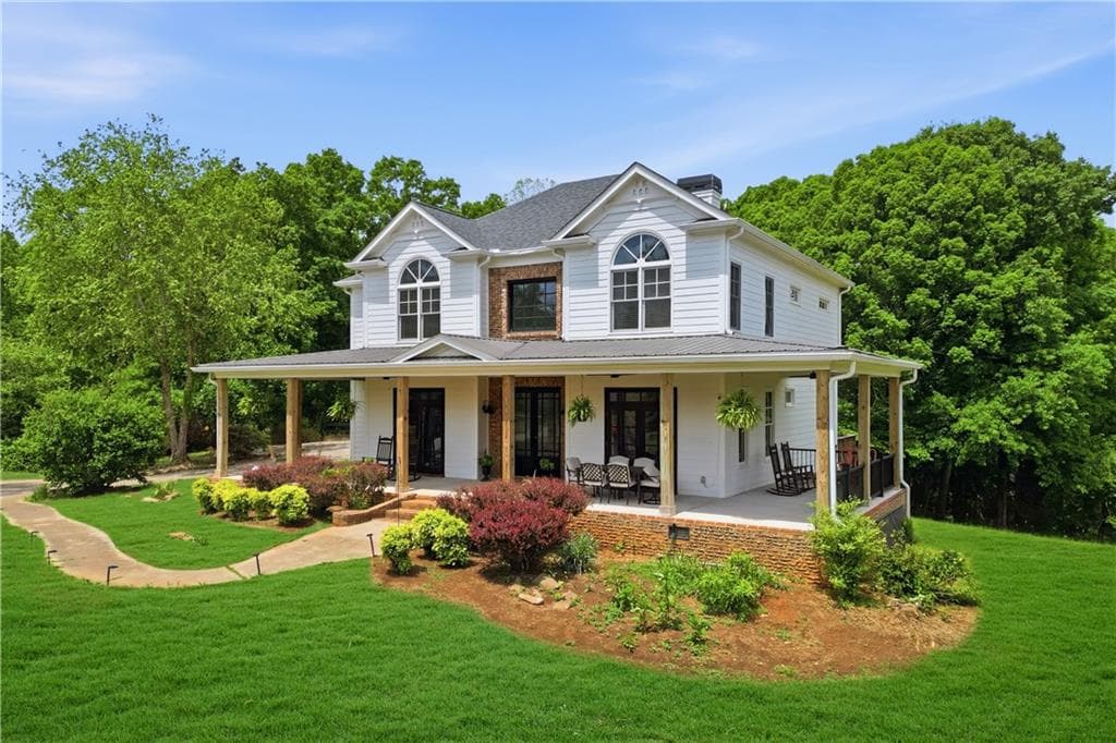 6 bedroom, 5 bathroom, 6,083 sq ft single family residence for sale at 3535 Dr Bramblett Road, Cumming, GA 30028 — photo 4