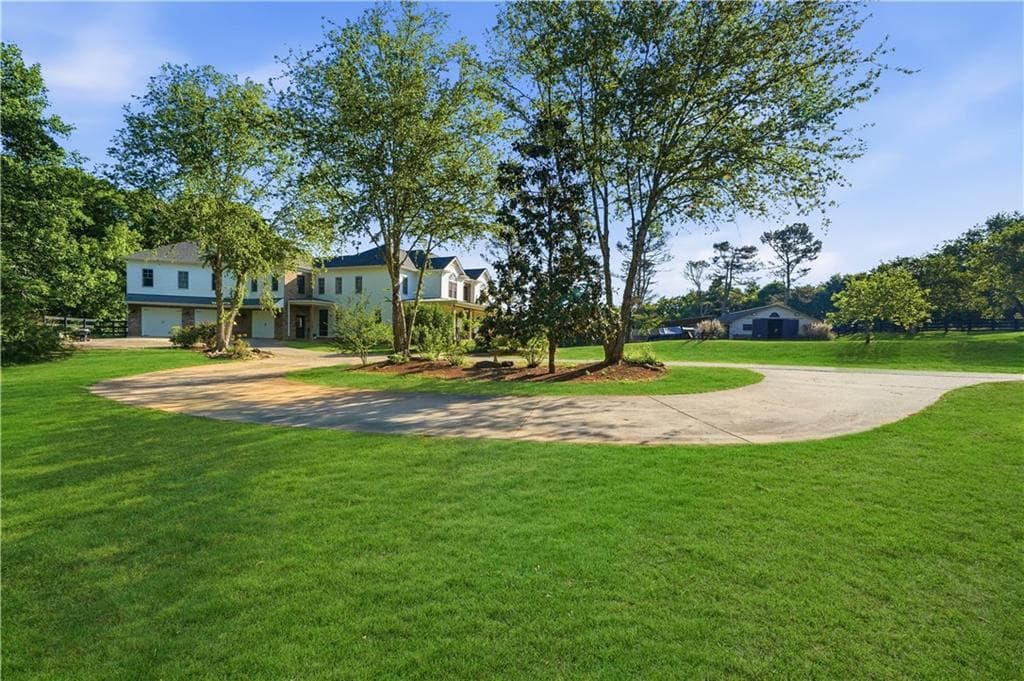 6 bedroom, 5 bathroom, 6,083 sq ft single family residence for sale at 3535 Dr Bramblett Road, Cumming, GA 30028 — photo 5