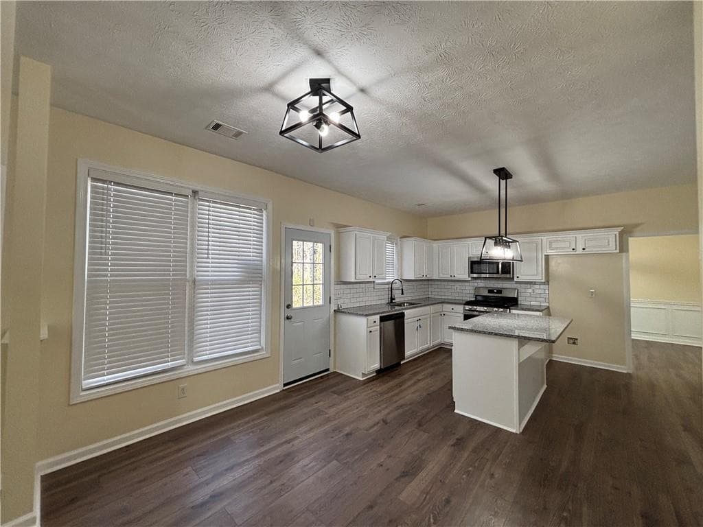 4 bedroom, 3 bathroom, 2,182 sq ft single family residence for sale at 3819 Wheaton Court, Snellville, GA 30039 — photo 10