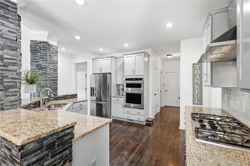 6 bedroom, 6 bathroom, 5,661 sq ft single family residence for sale at 2808 Rosebud Road, Loganville, GA 30052 — photo 8