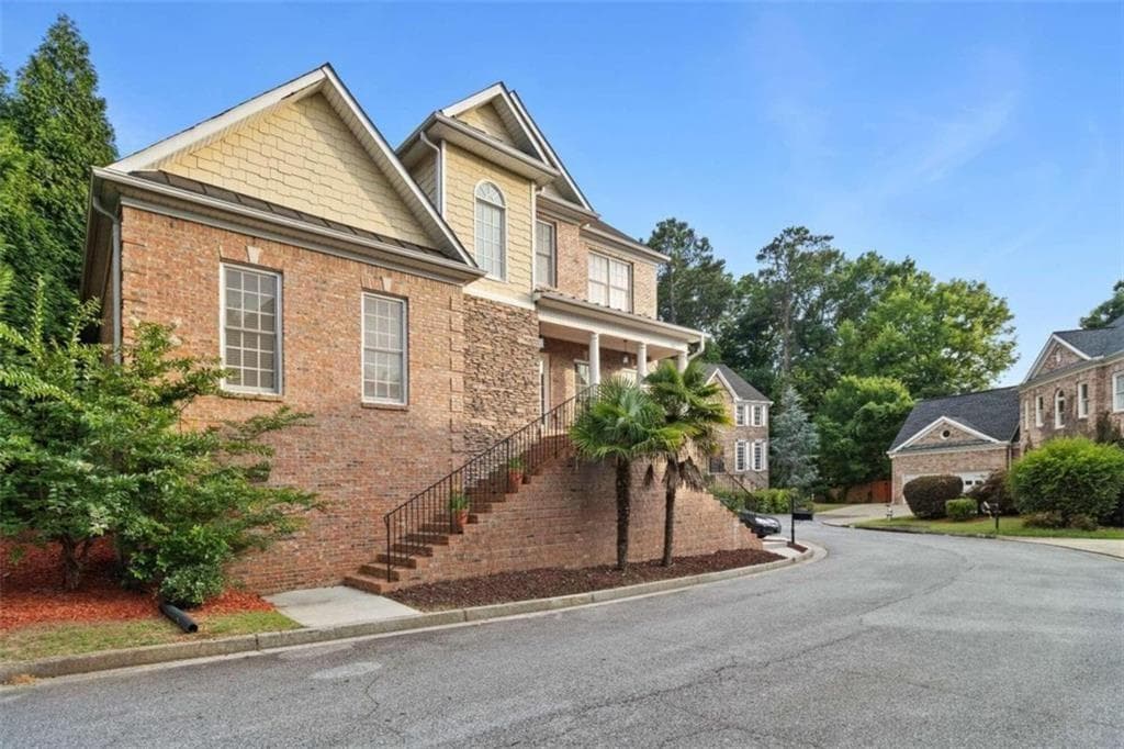 5 bedroom, 4 bathroom, 4,027 sq ft single family residence for sale at 1711 Summit Glen Lane, Atlanta, GA 30329
