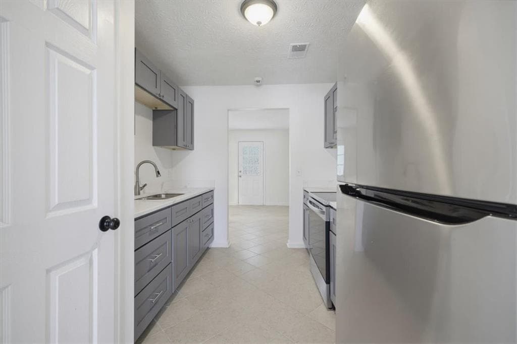 2 bedroom, 2 bathroom, 1,010 sq ft townhouse for sale at 1324 Hollenbeck Lane, Riverdale, GA 30296 — photo 8