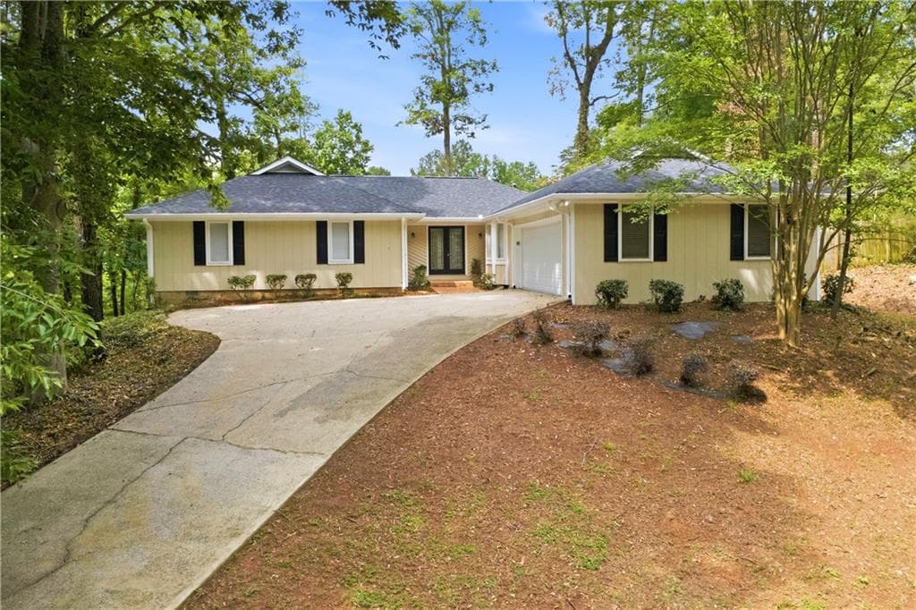 3 bedroom, 2 bathroom, 1,869 sq ft single family residence for sale at 495 Knoll Woods Drive, Roswell, GA 30075