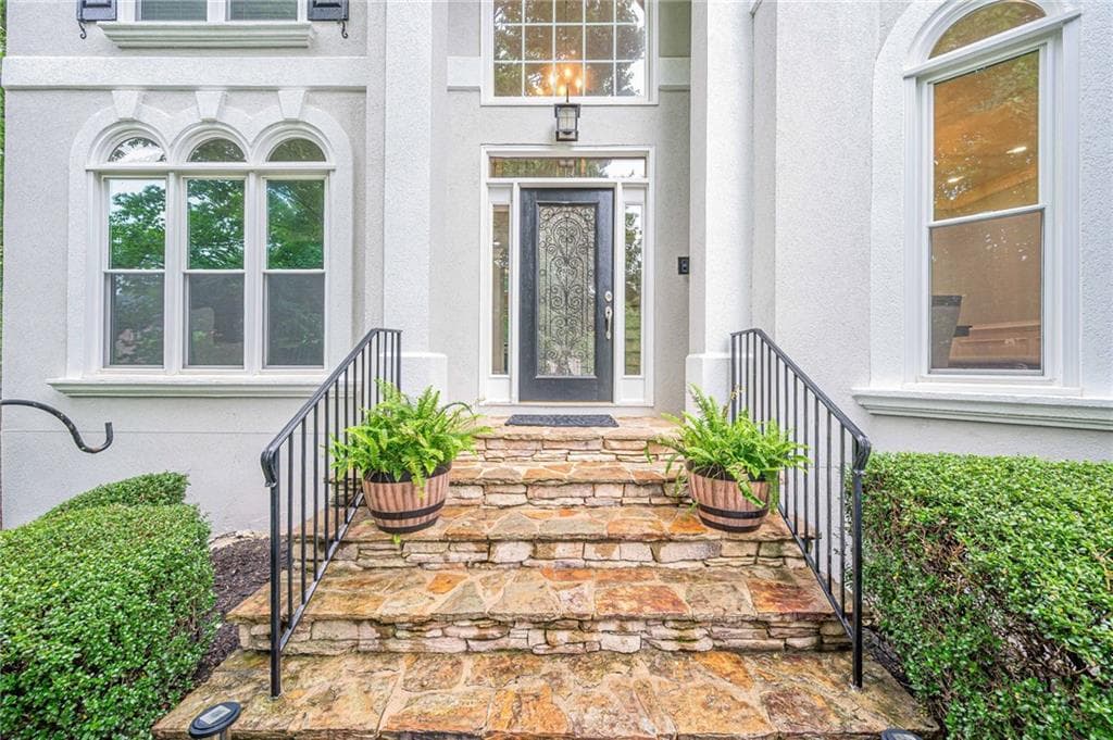6 bedroom, 6 bathroom, 6,645 sq ft single family residence for sale at 10425 High Falls Circle, Johns Creek, GA 30022 — photo 2